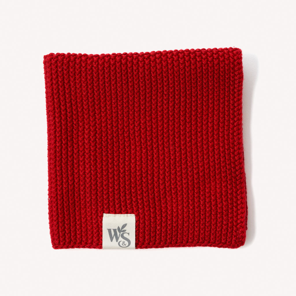 Wild and Stone organic cotton dishcloth featuring a soft, absorbent fabric and natural texture for eco-friendly kitchen use.