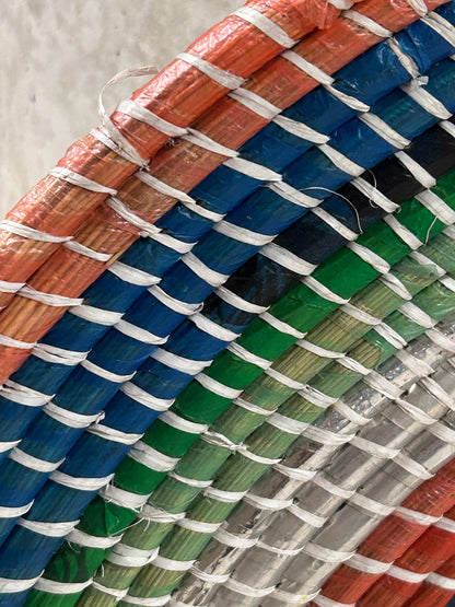 Zambian Wall Basket by Botanical Boys, handcrafted woven basket with intricate patterns, ideal for wall decor or storage.