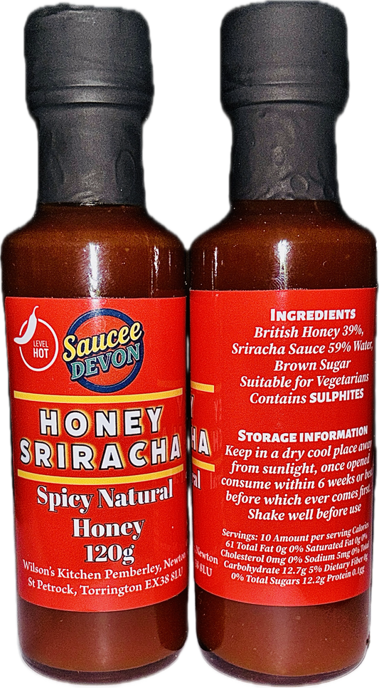 Spicy Honey Sriracha sauce in a glass jar from Wilson’s Kitchen, showcasing the artisan chili sauce with a vibrant red hue.