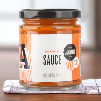Janda Food Buffalo Sauce in a glass jar with an orange and white label, perfect for spicy barbecue dishes.