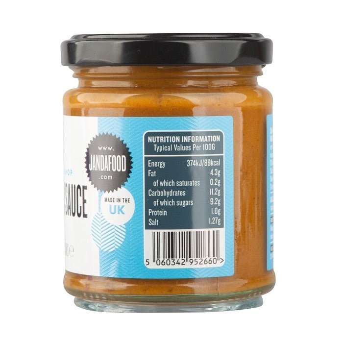 Janda Chip Shop Curry Sauce label featuring bold text and vibrant colors, showcasing the jar’s front label design.