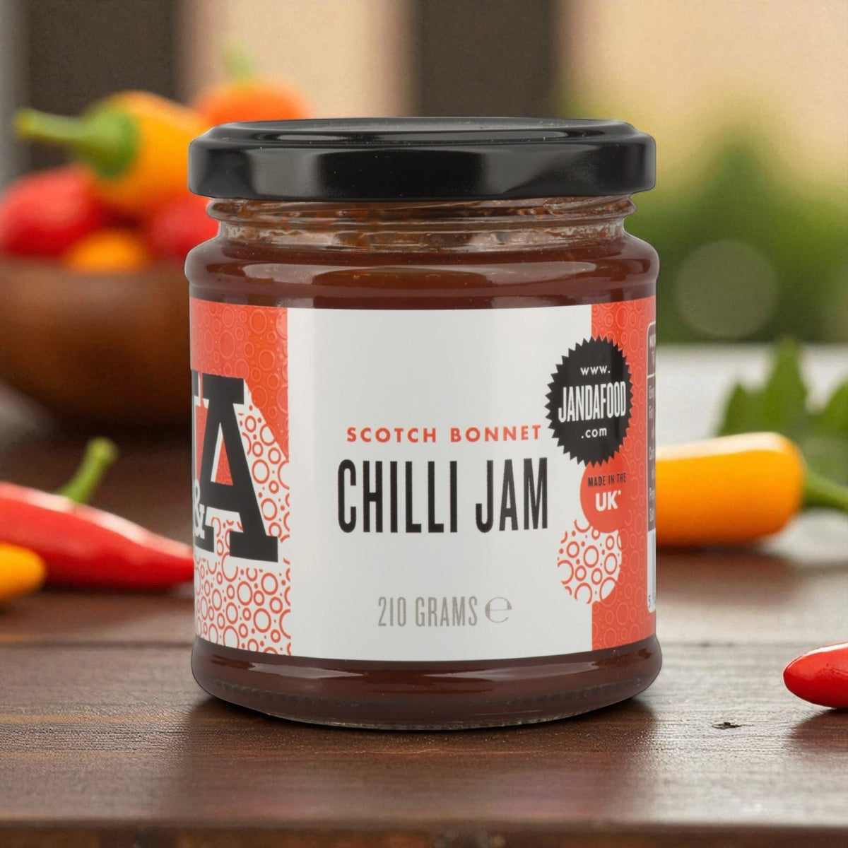 Janda Scotch Bonnet Chilli Jam jar, 210g, showcasing the spicy and sweet chili jam with a colorful label and lid.