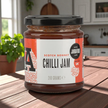 Janda Scotch Bonnet Chilli Jam 210g jar with bright red chili jam, showcasing a sweet and spicy condiment for cheese and barbecue.