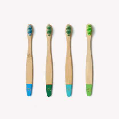 Children's bamboo toothbrushes in aqua color, Wild And Stone 4-pack, eco-friendly toothbrushes for kids with soft bristles.