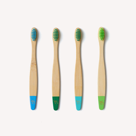 Children's bamboo toothbrushes in aqua color, Wild And Stone 4-pack, eco-friendly toothbrushes for kids with soft bristles.