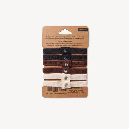 Six natural plastic-free hair ties from Wild And Stone in a 6-pack, made of eco-friendly materials for gentle hold.