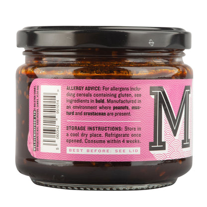 Manfood Korean Taco Sauce bottle with label, showcasing vibrant sauce and branding on a plain background.