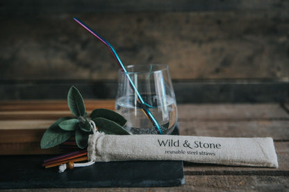 Set of eight rainbow reusable stainless steel drinking straws by Wild and Stone, featuring colorful, durable, eco-friendly design.