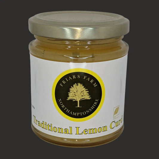 Cropped image of Friars Farm traditional lemon curd jar, showcasing the smooth, vibrant yellow lemon-flavored spread.