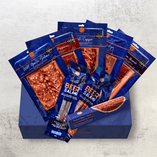 Assorted Bray Cured charcuterie selection featuring cured meats and delicacies on a wooden platter.