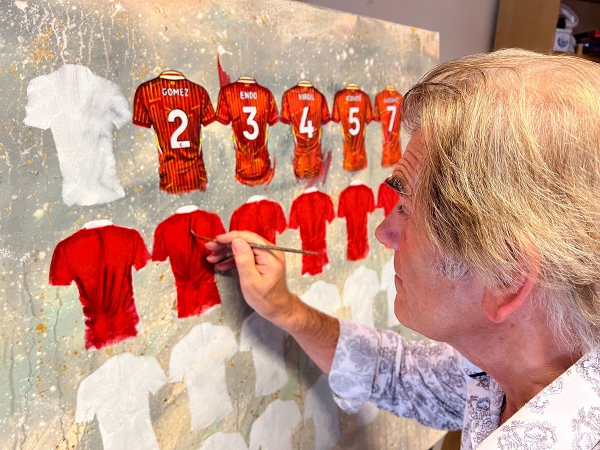 Limited edition Liverpool 2024-25 Reds shirt art print by Terry Kneeshaw, showcasing team imagery and vibrant colors.
