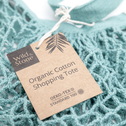 Blue organic cotton crochet tote bag by Wild And Stone, featuring a spacious design and handcrafted details.