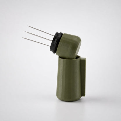 KNOCDIC® magnetic WDT tool with olive green handle and magnetic holder for precise watch repair and adjustment.