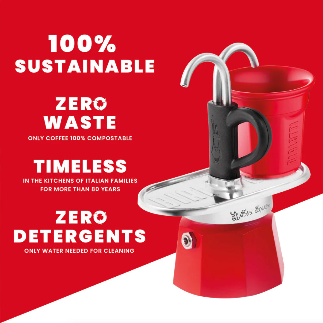 Bialetti Mini Express 'R' double serve coffee maker brewing fresh Italian coffee with two cups, part of Brew Italia hardware collection.