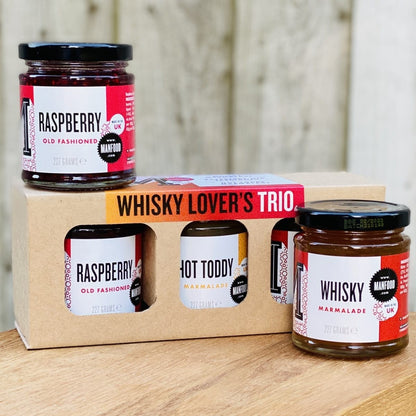 Manfood Whisky Lover's Trio Marmalade Gift Set in a decorative gift box with three jars of gourmet marmalade.