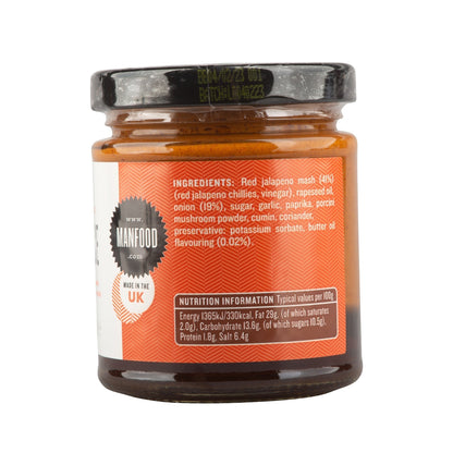 Manfood vegan Buffalo sauce label featuring butter-flavored chili and onion sauce in a clear glass bottle.