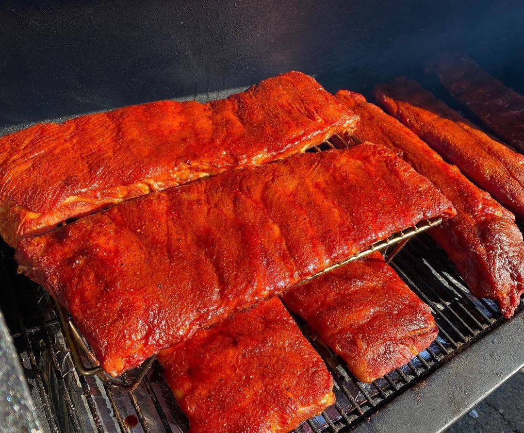 FireFly Barbecue Memphis Sweet BBQ Rub in a jar, showcasing the colorful spice blend for grilling and smoking meats.