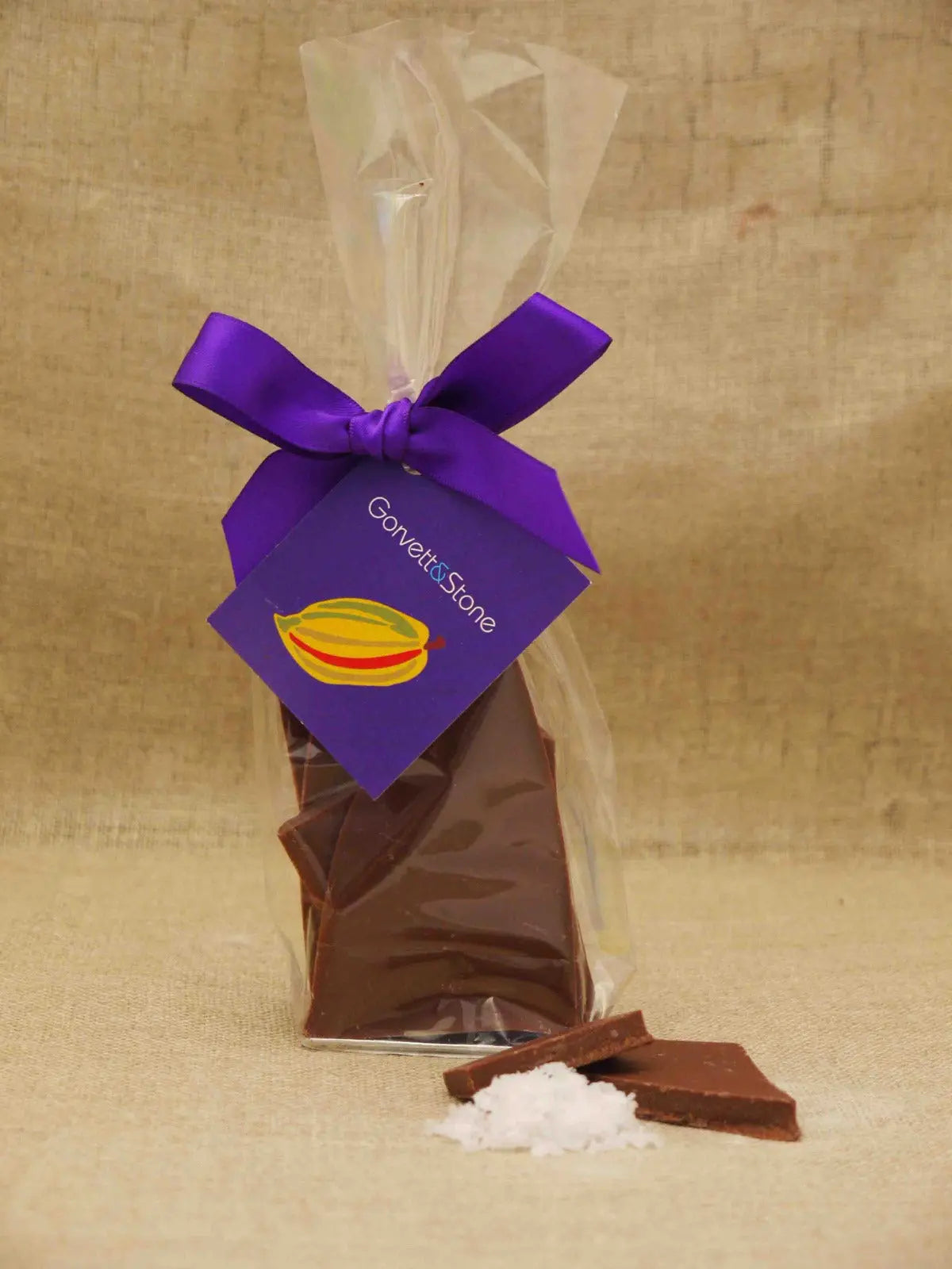 Gorvett & Stone sea salt shards in fine milk chocolate, showing crispy chocolate shards with sea salt crystals in a bag.