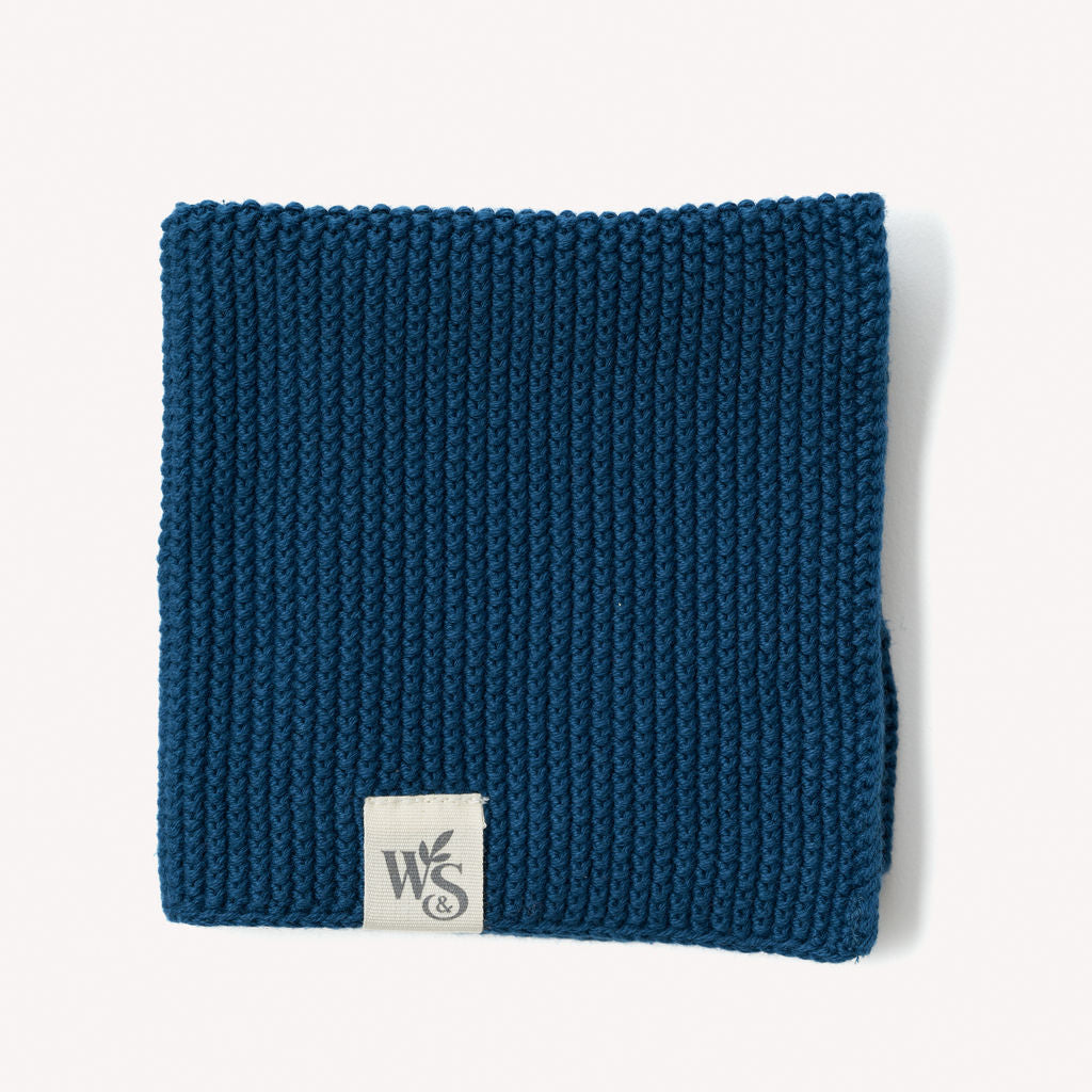Organic cotton dishcloth from Wild And Stone, showcasing a soft, eco-friendly dish cloth with a woven texture.