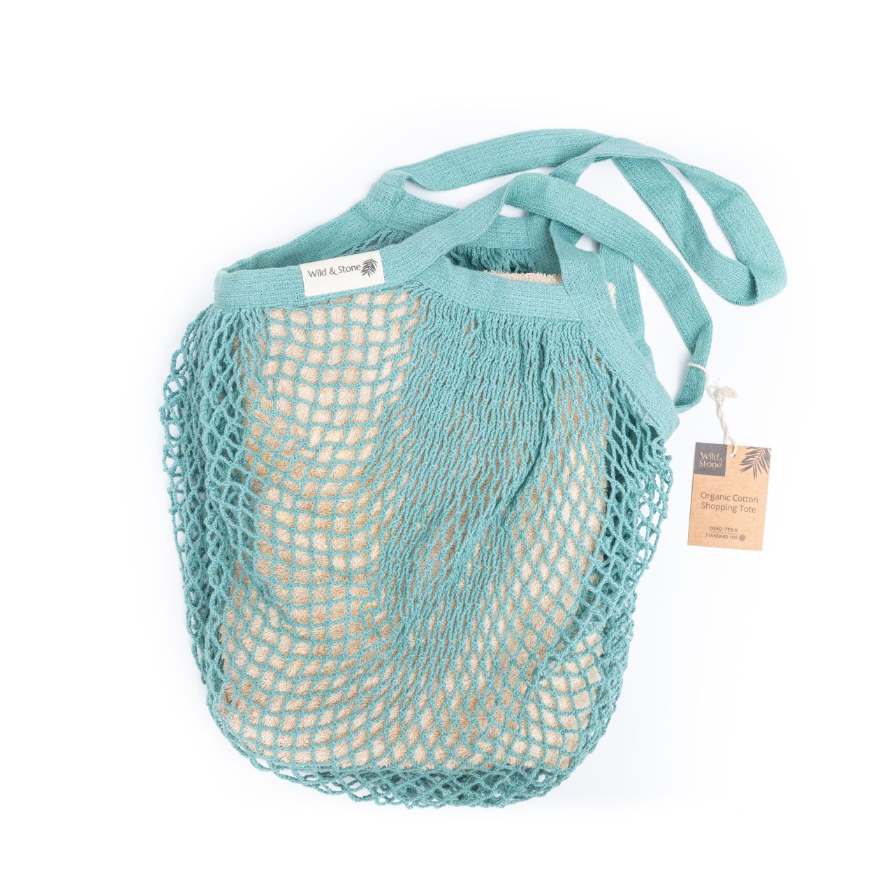 Organic cotton blue crochet tote bag from Wild And Stone, showing its woven texture and spacious design for daily use.