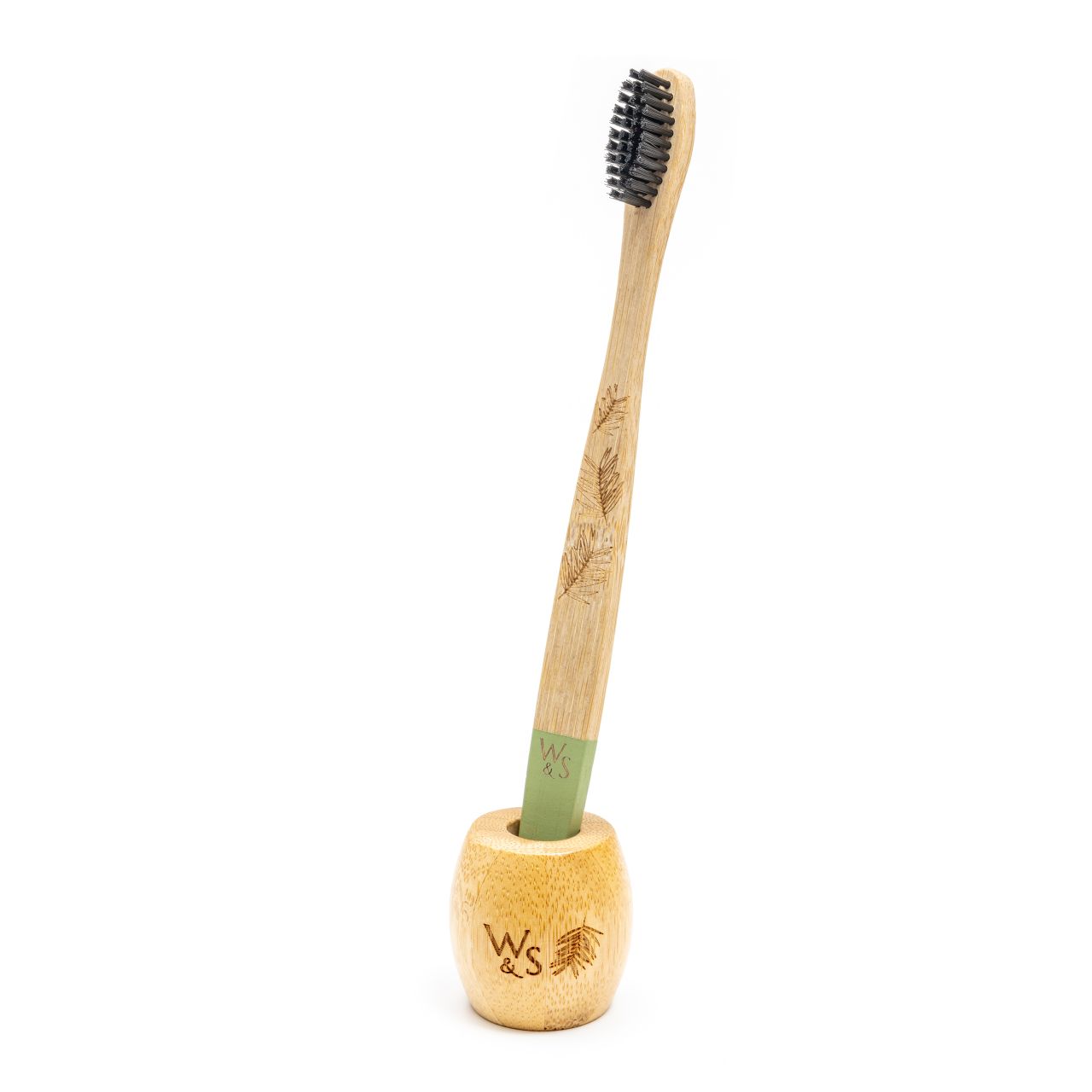 Wild and Stone bamboo toothbrush stand for adults, showcasing a sleek, eco-friendly holder with multiple slots for toothbrushes.