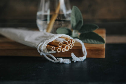 Set of 10 reusable bamboo drinking straws by Wild And Stone, eco-friendly and biodegradable, ideal for beverages.