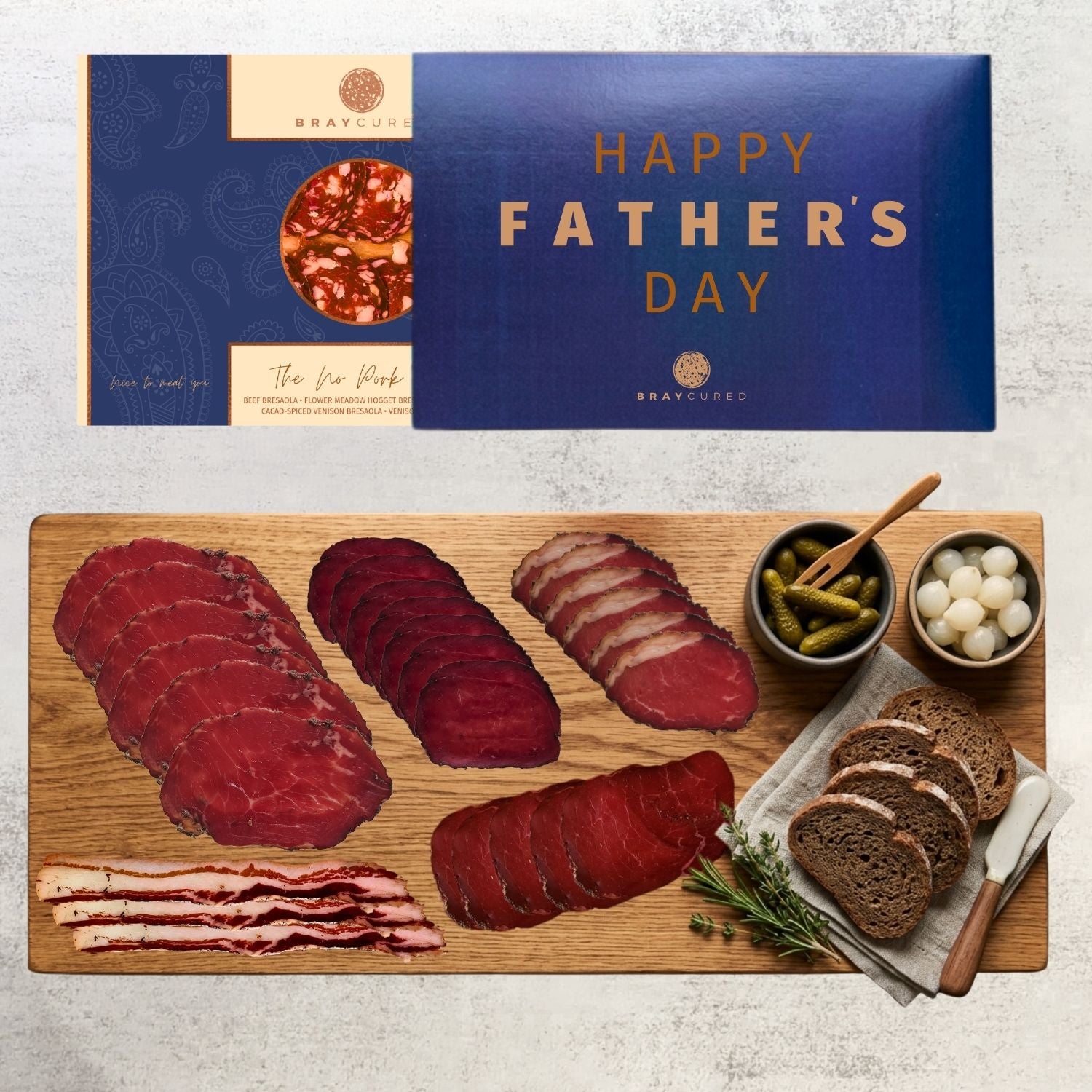 Bray Cured No Pork Feasting Five charcuterie selection on a wooden board with Happy Father's Day sleeve, ideal for pork-free snacking.