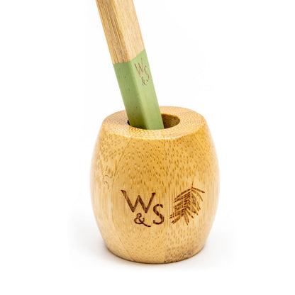 Wild and Stone bamboo toothbrush stand for adults, designed to hold and organize toothbrushes in a sleek, eco-friendly bathroom accessory.