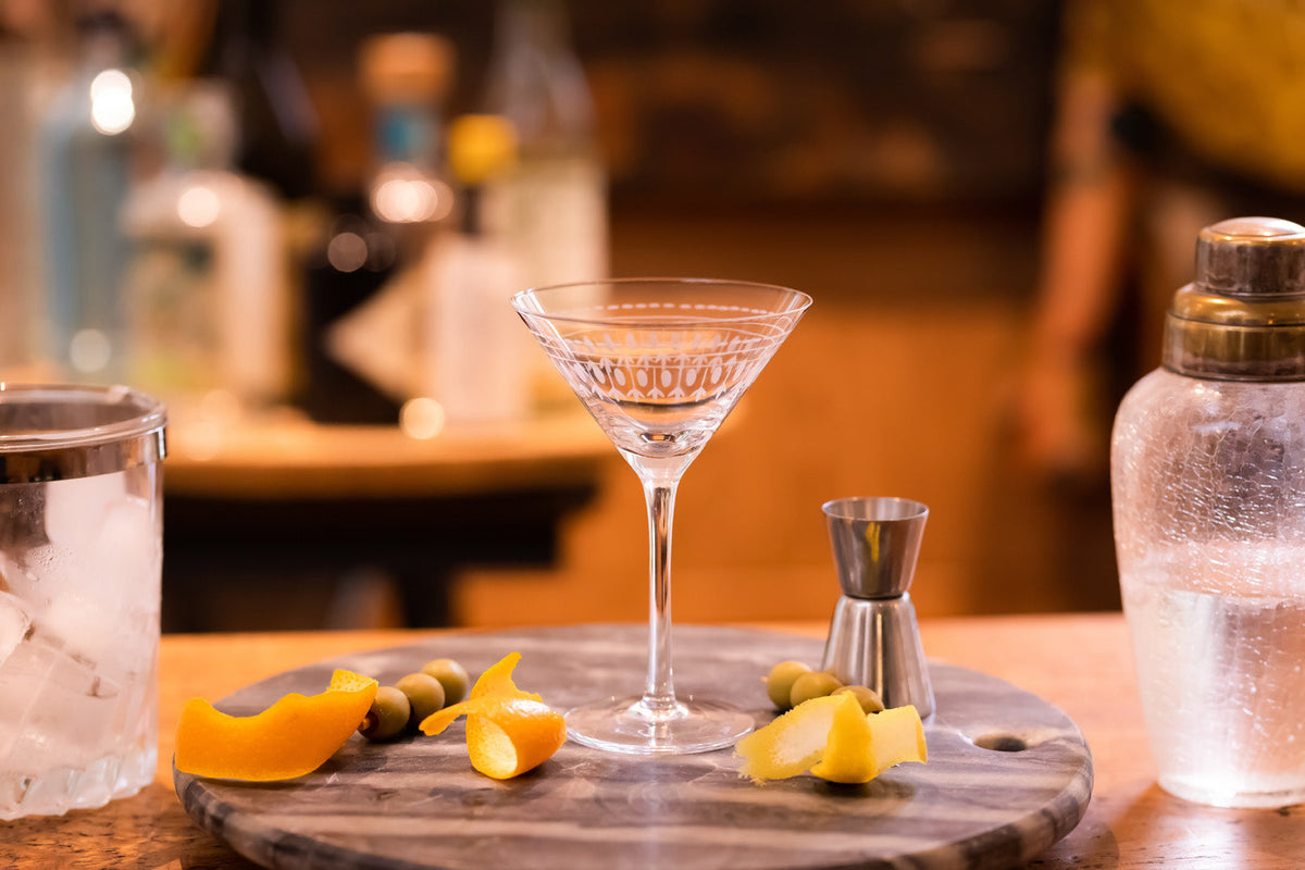 Pair of Vintage List crystal martini glasses with oval design, showcasing elegant stemware for cocktails.