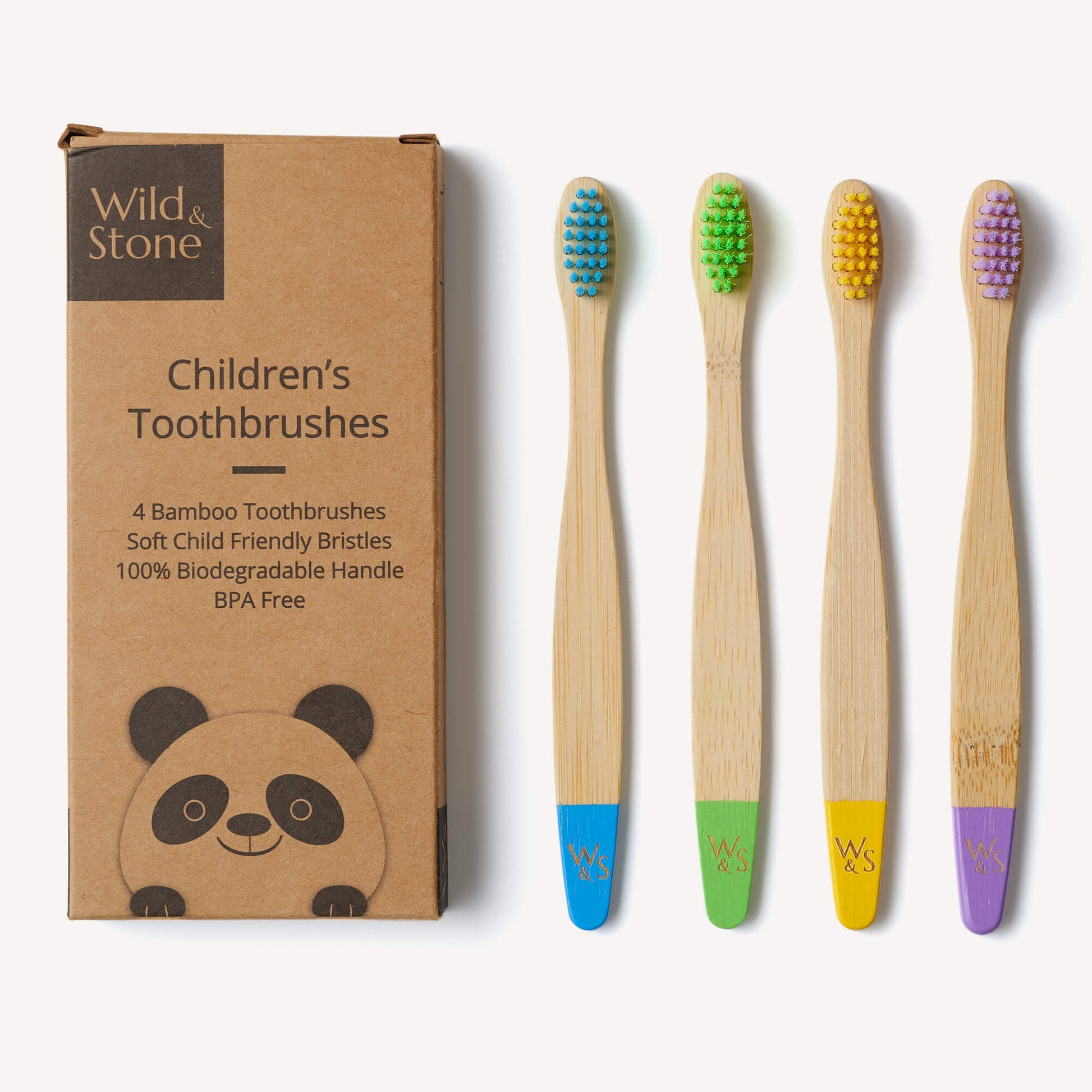 Four colorful children's bamboo toothbrushes by Wild and Stone, eco-friendly and designed for gentle brushing.