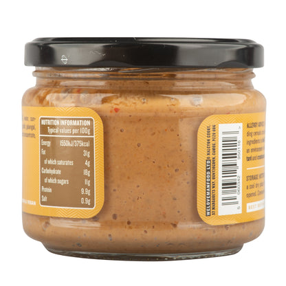 Creamy peanut satay sauce in a jar, made by Manfood, perfect for dipping or adding flavor to dishes.