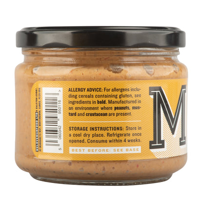 Creamy peanut satay sauce by Manfood in a bowl, showcasing smooth texture and rich peanut flavor.