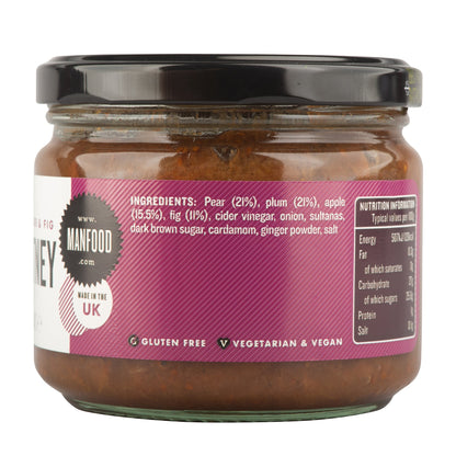 Manfood pear, apple, fig, and plum chutney in a jar with fresh fruit slices, showcasing a colorful, flavorful condiment.