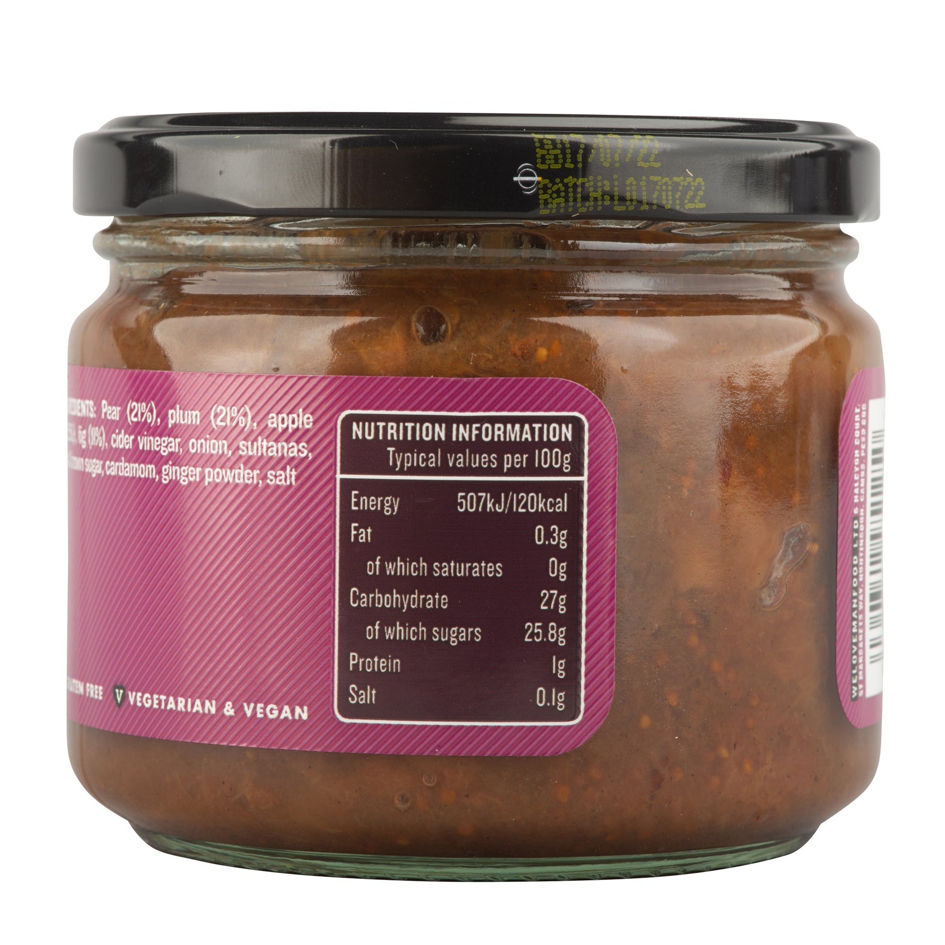 Jar of Manfood pear, apple, fig, and plum chutney with fresh fruit visible around the jar.