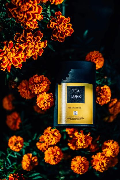 Tealore The Lore of Chi gift box featuring natural energy booster with herbal ingredients, caffeine-free, in elegant packaging.