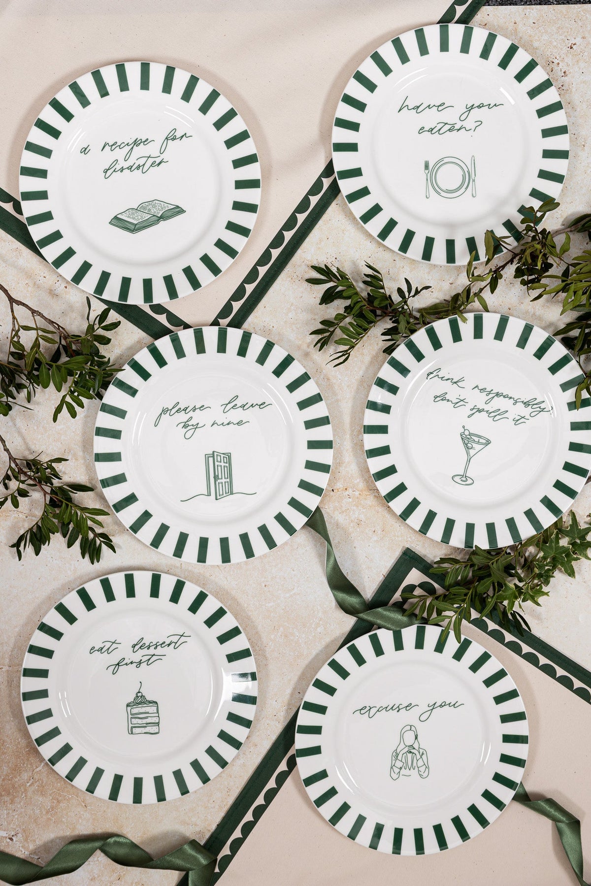 Set of Avalon Home UK Have You Eaten Bone China plates with elegant floral patterns and smooth white finish.