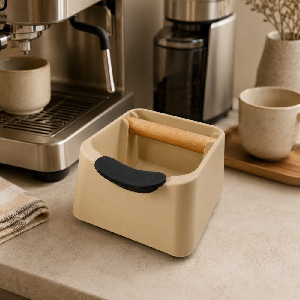 KNOCDIC® The Pod coffee knock box with black exterior and stainless steel bar for espresso grounds disposal, placed on a countertop
