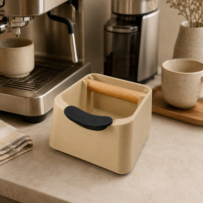 KNOCDIC® The Pod coffee knock box with black exterior and stainless steel bar for espresso grounds disposal, placed on a countertop