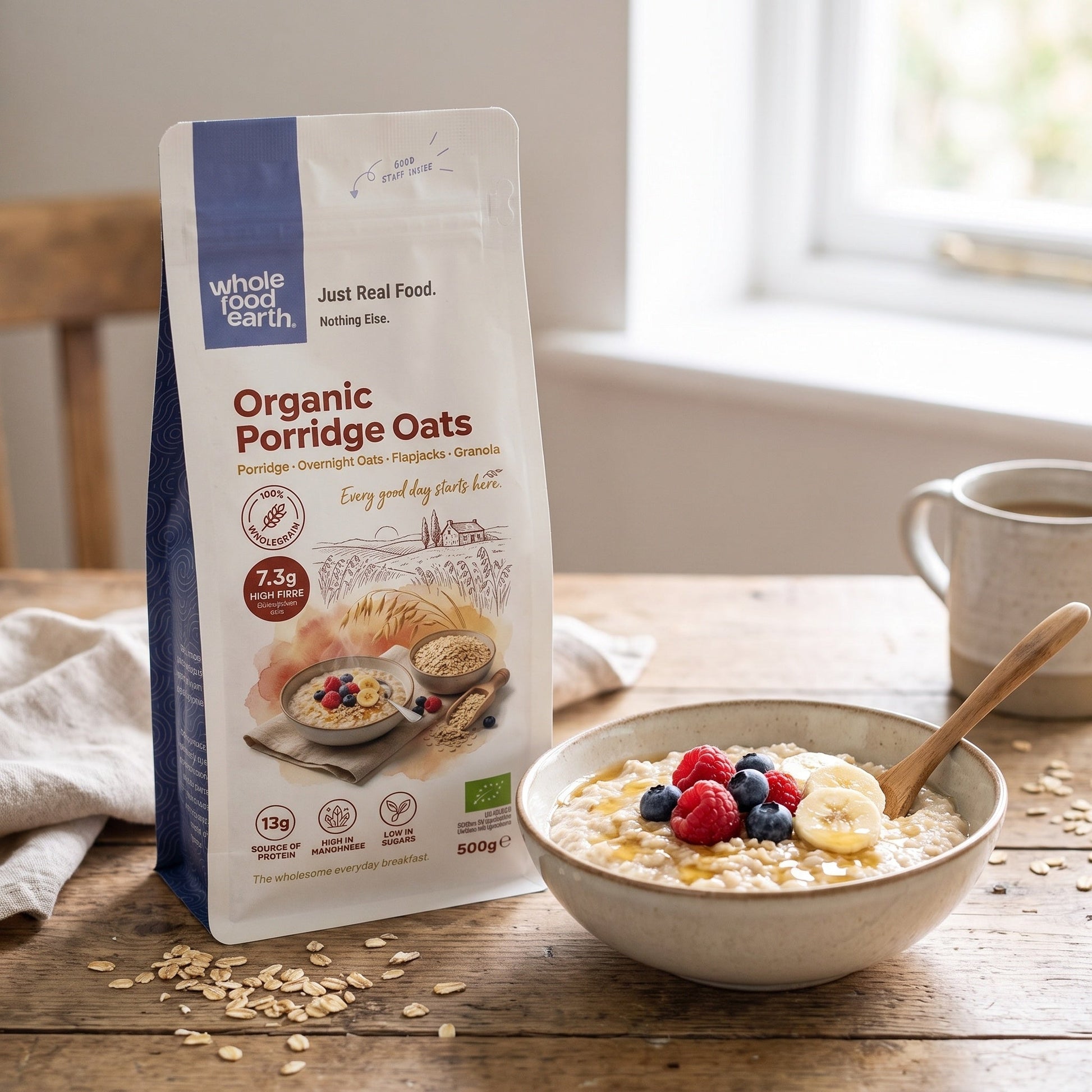 Bowl of organic Whole Food Earth porridge oats with a spoon, surrounded by oats and a cozy breakfast setting.