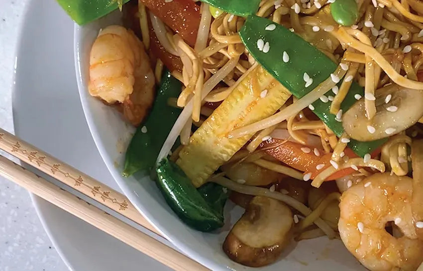 Small bowl of Peking sweet and savory vegan sauce from Taishon, perfect for enhancing prawn noodle dishes.