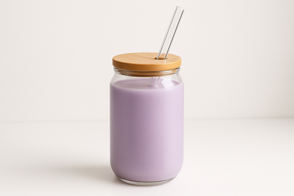 Purple Ube protein drink by Siocolat in a glass with a frothy top, showcasing vibrant purple color and creamy texture.