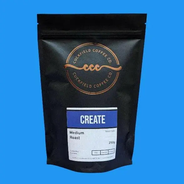 Medium roast coffee created by Cuckfield Coffee Co., shown in a close-up image of the coffee beans and packaging.