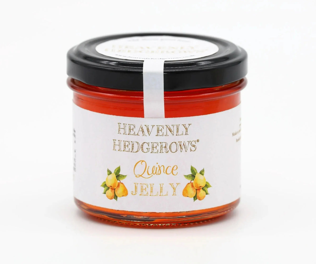 Heavenly Hedgerows quince jelly condiment, perfect for cheese pairings, with a clear jar and golden jelly visible.