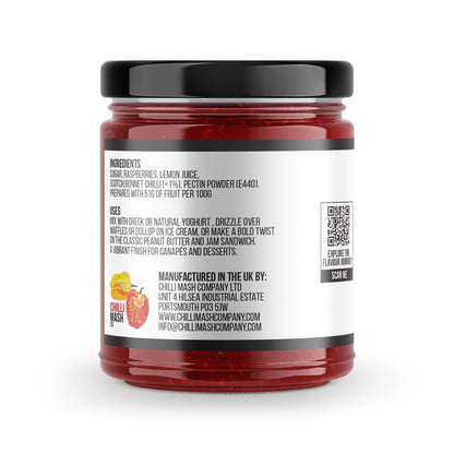 190g jar of Chilli Mash Co. Raspberry Chilli Jam with vibrant red jam and fresh raspberry and chili pieces visible inside.