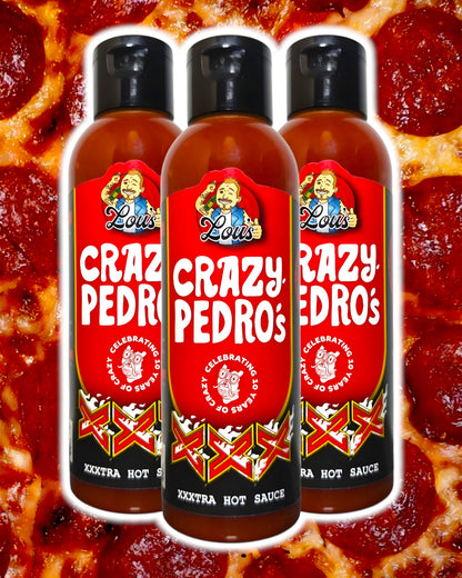 Bottle of Lou's Brews x Crazy Pedros XXX hot sauce, featuring vibrant label design and spicy condiment inside.