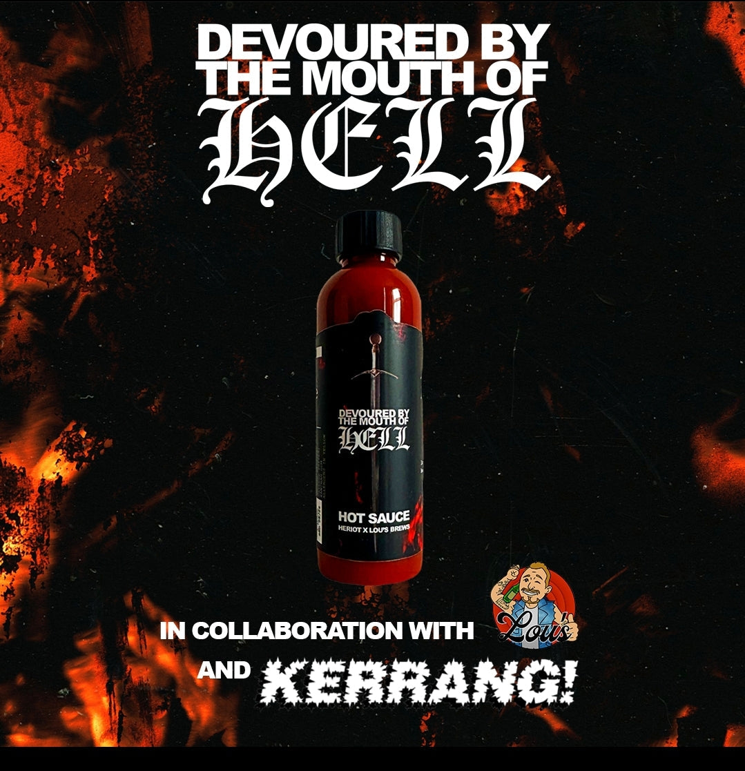 Bottle of Lou's x Heriot x Kerrang Devoured By The Mouth Of Hell Hot Sauce with fiery label design