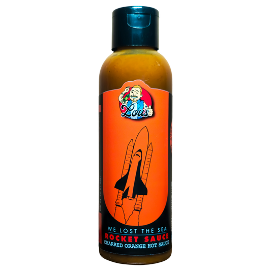 Lou's Brews Rocket Sauce Charred Orange condiment bottle, hot sauce with vibrant orange label and fiery appearance.