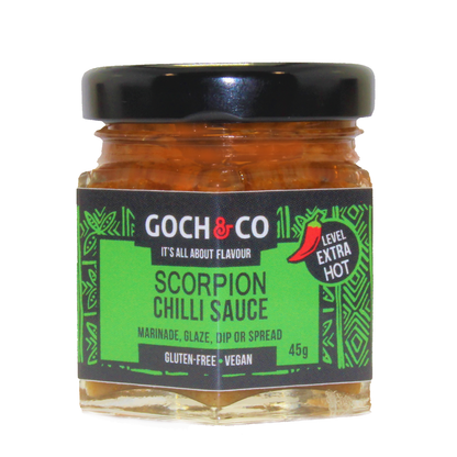 Goch & Co Scorpion Chilli Sauce bottle with fiery red sauce inside, label featuring a scorpion illustration and bold branding.