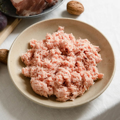 Primrose Herd Cornish Heritage Pork Sausage Meat in a 500g package showing fresh, coarsely ground sausage meat.