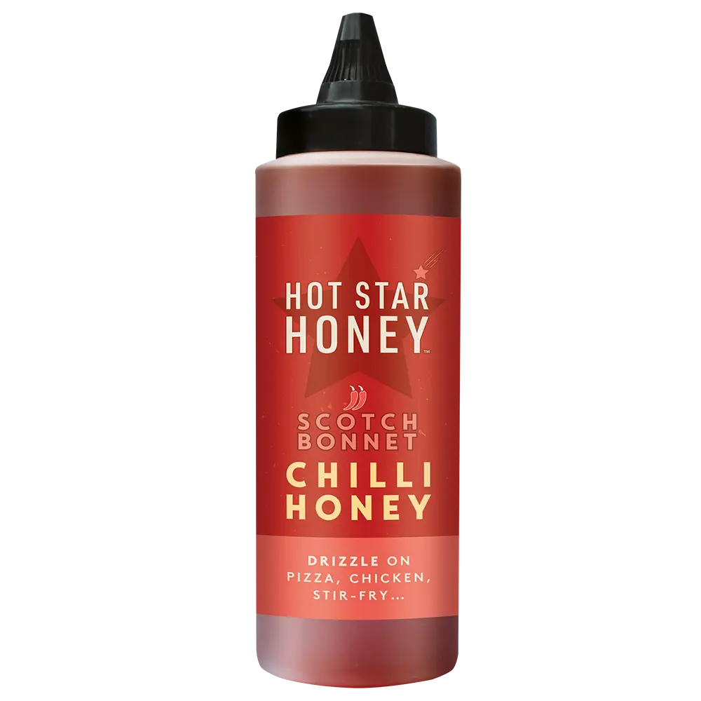 Hot Star Honey Scotch Bonnet Chilli Honey in a bottle, showcasing vibrant Scotch bonnet peppers and golden honey inside.